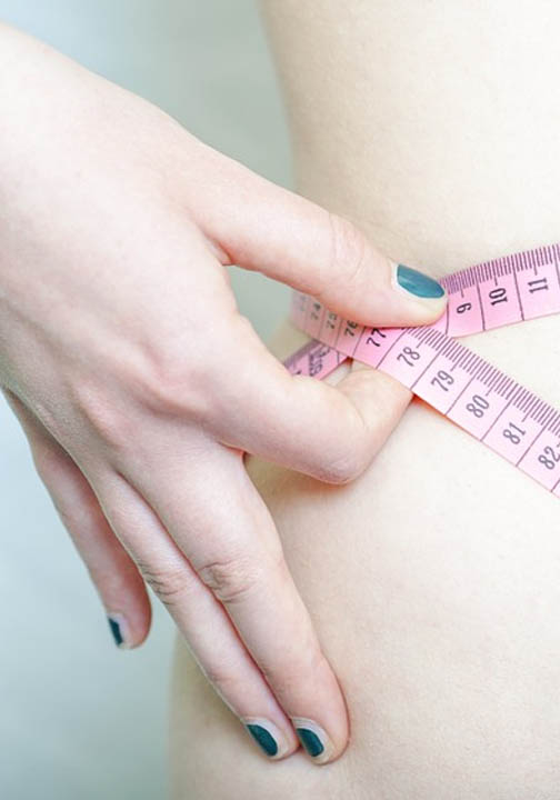 Tape measure around someone's waist